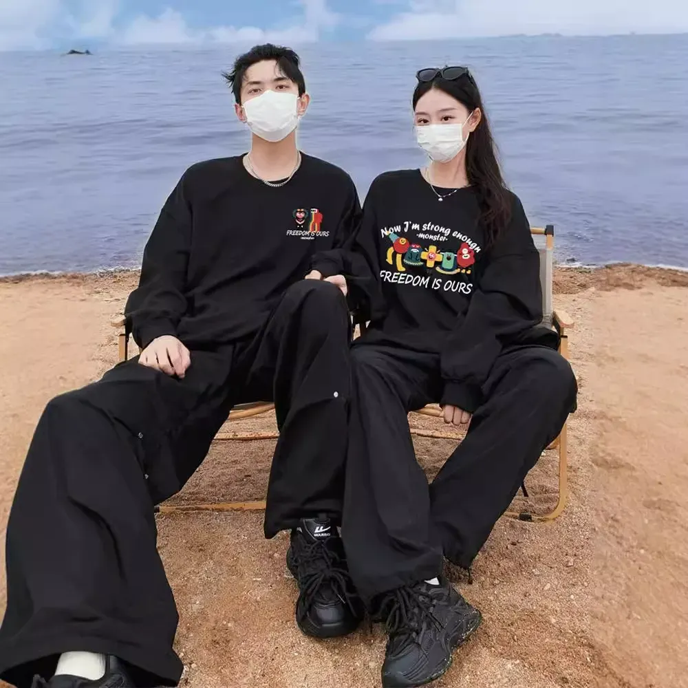 カップルペアルック 「FREEDOM MONSTERS」 グラフィックライントレーナー