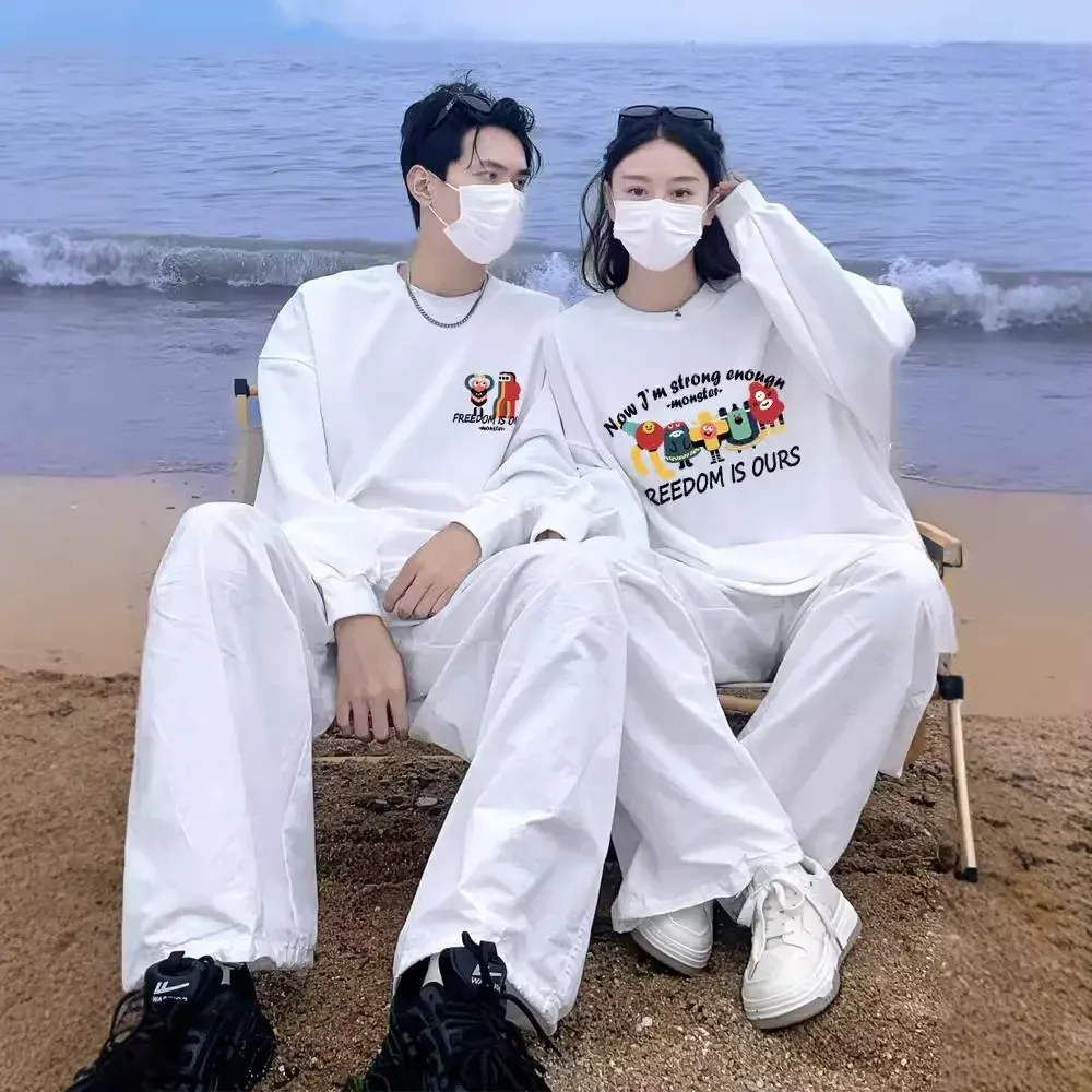 カップルペアルック 「FREEDOM MONSTERS」 グラフィックライントレーナー